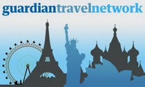 t_network Guardian Travel Network Logo